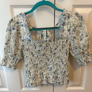 Cute smocked bodice, tie back and slightly cropped summer top